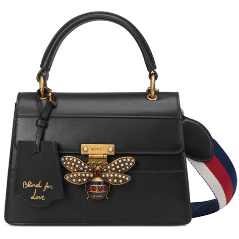 gucci bee handbag|More.